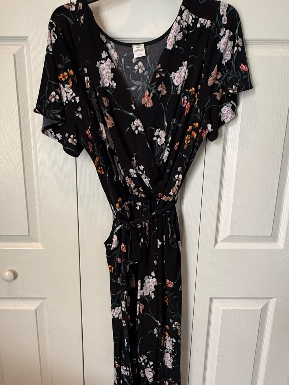 # Kaileigh 2X Black Floral Wrap-bodice Cropped Leg Jumpsuit
